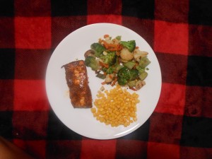 A balanced meal could include salmon, corn, and broccoli.