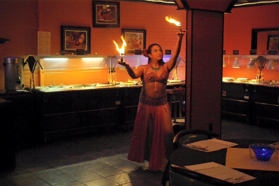 Dani Tea performing fire and sword.